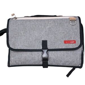 SkipHop grey portable diaper changing pad bag